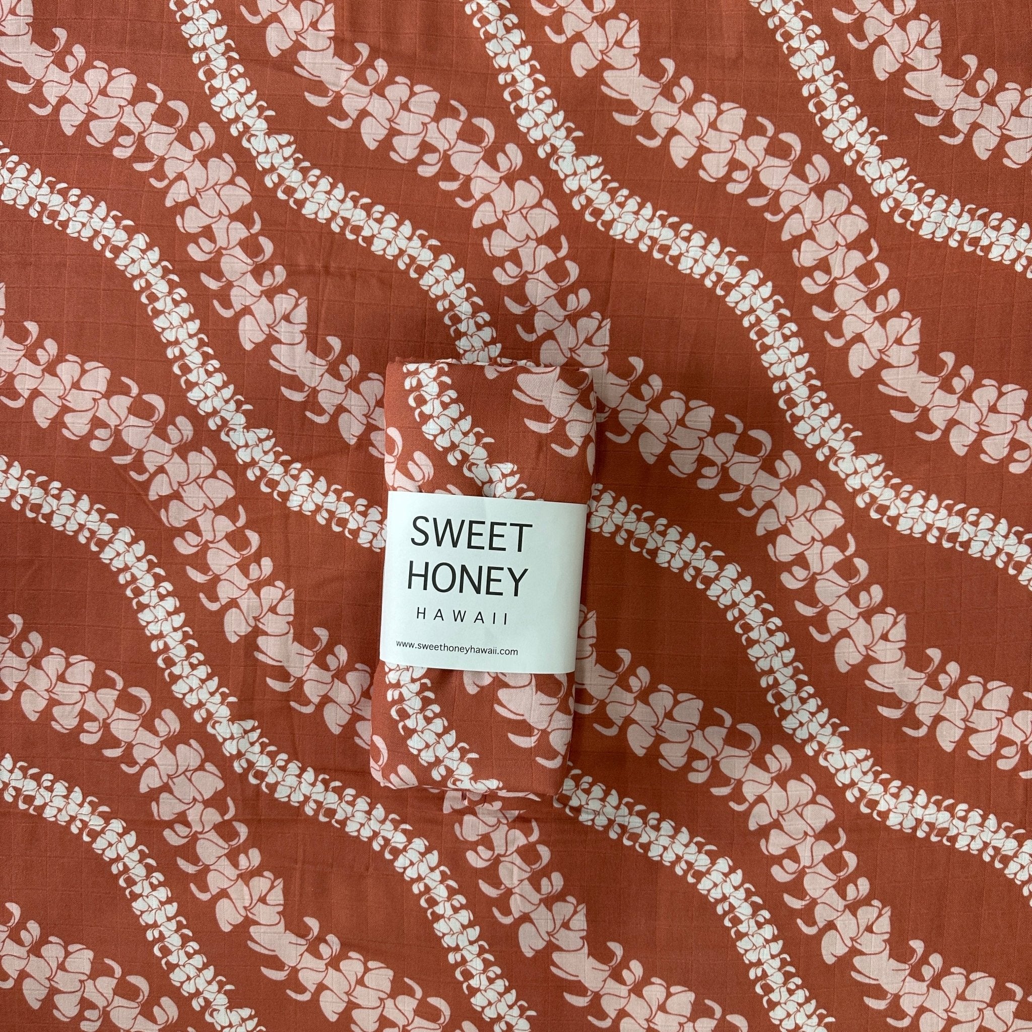 Brick Puakenikeni Lei Swaddle Blanket - Sweet Sweet Honey Hawaii